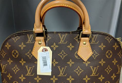 dillard's vintage louis vuitton sale.